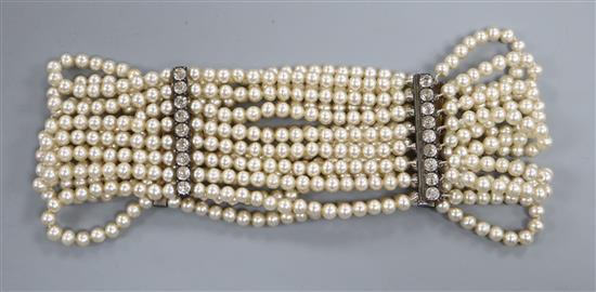 A multi strand simulated pearl and white paste set choker necklace, 32.7cm.